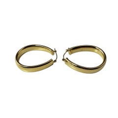 Pendientes de aro ovalados de oro amarillo de 14 quilates #19758