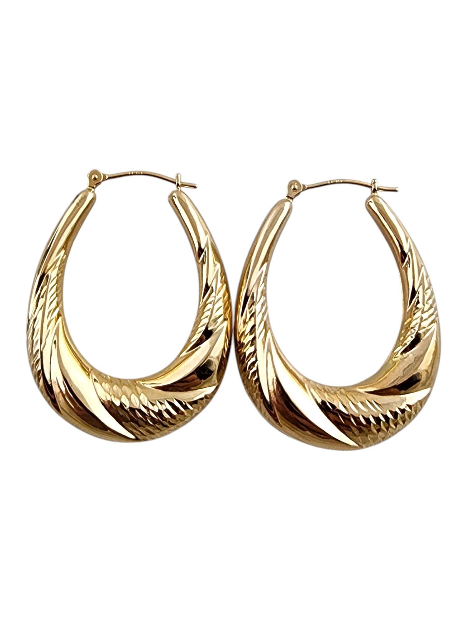 Women's 14 Karat Yellow Gold Oval Hoop Earrings #19763 For Sale