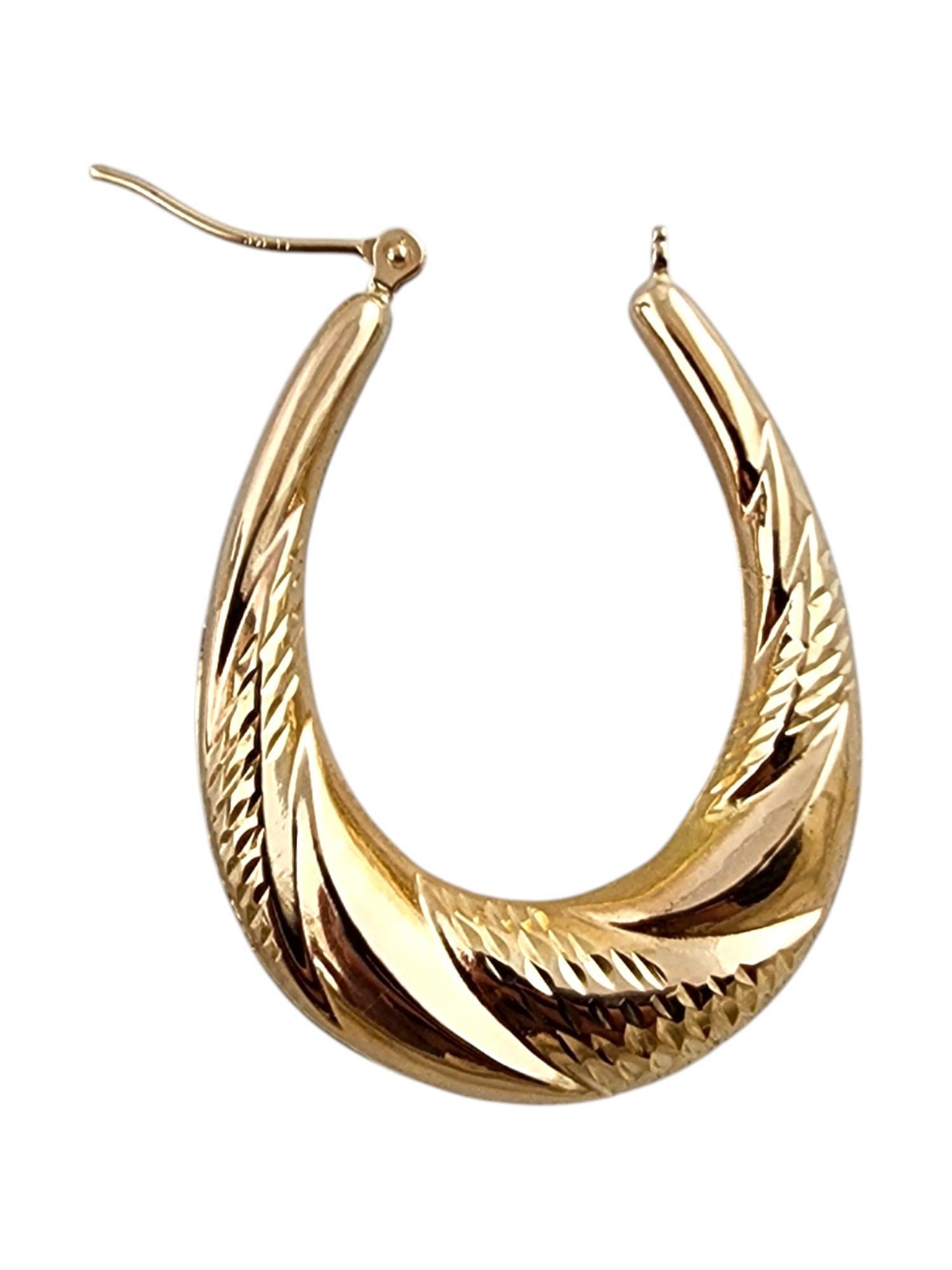 14 Karat Yellow Gold Oval Hoop Earrings #19763 For Sale 1