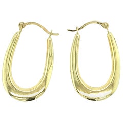 14 Karat Yellow Gold Oval Hoop Earrings