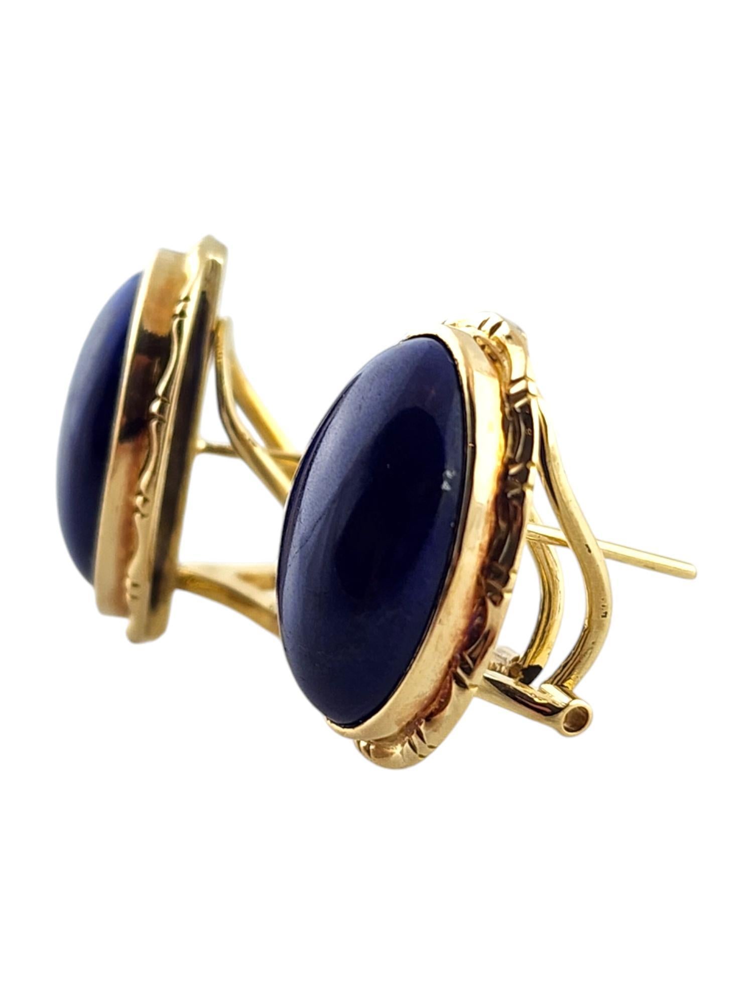 14 Karat Yellow Gold Oval Lapis Omega Back Earrings

These stunning, omega back earrings were meticulously crafted from 14K yellow gold with two oval cabochon lapis bezel set stones for a beautiful finish!

Size: 21.7mm X 16.8mm X 7.1mm

Weight: