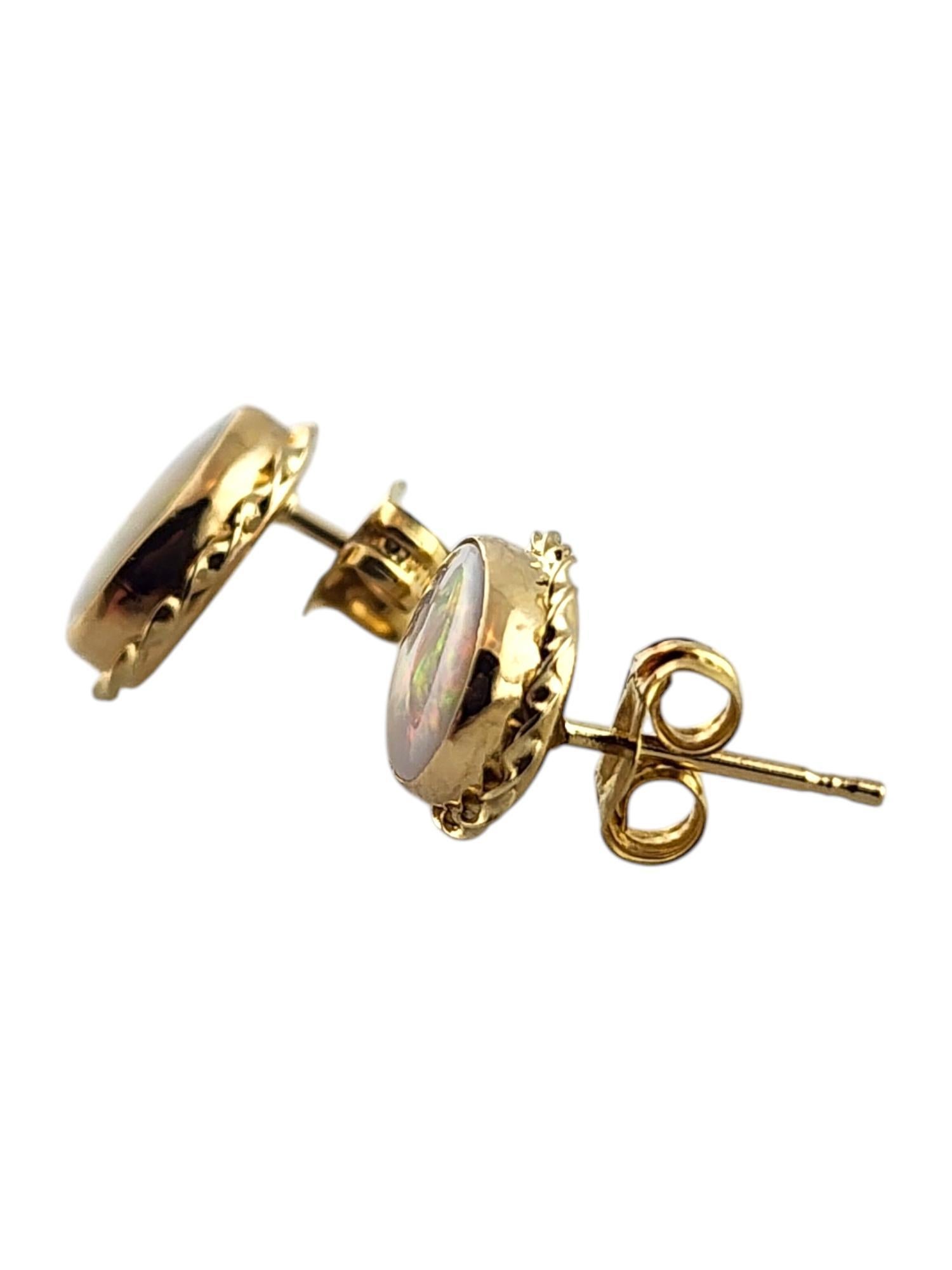 Oval Cut 14 Karat Yellow Gold Oval Opal Earrings #19804