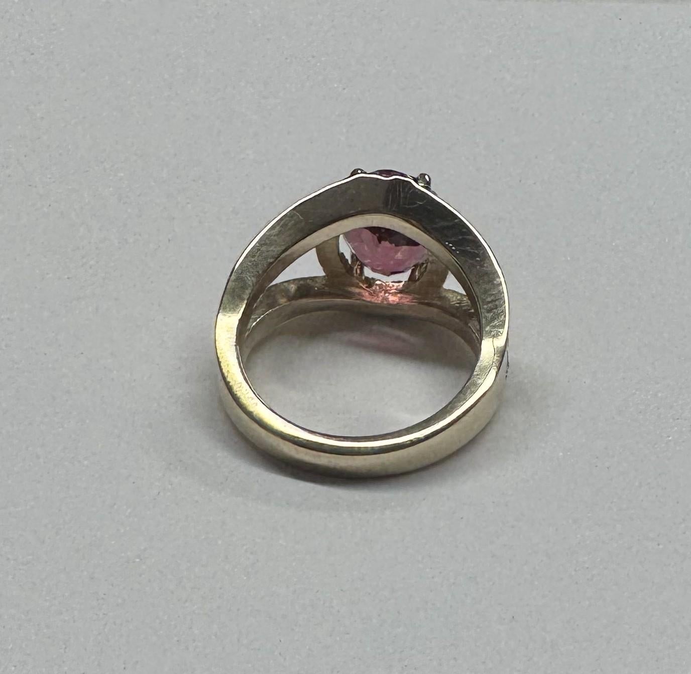 Contemporary 14 Karat Yellow Gold Oval Pink Tourmaline Diamond Halo Ring For Sale