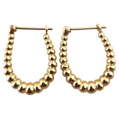 14 Karat Yellow Gold Oval Puffy Bead Hoop Earrings #18996