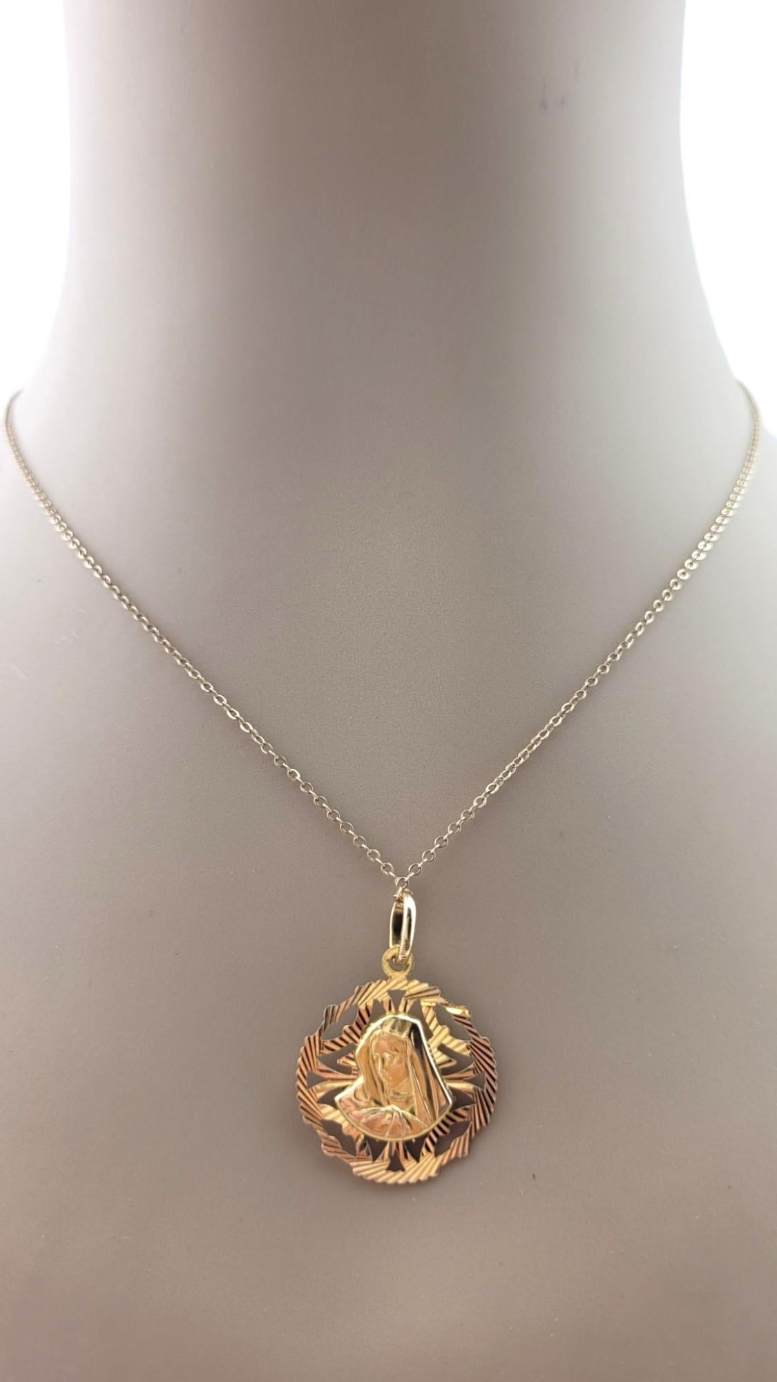 14 Karat Yellow Gold Oval Reversable Jesus Christ and Virgin Mary Pendant #21126 For Sale 6