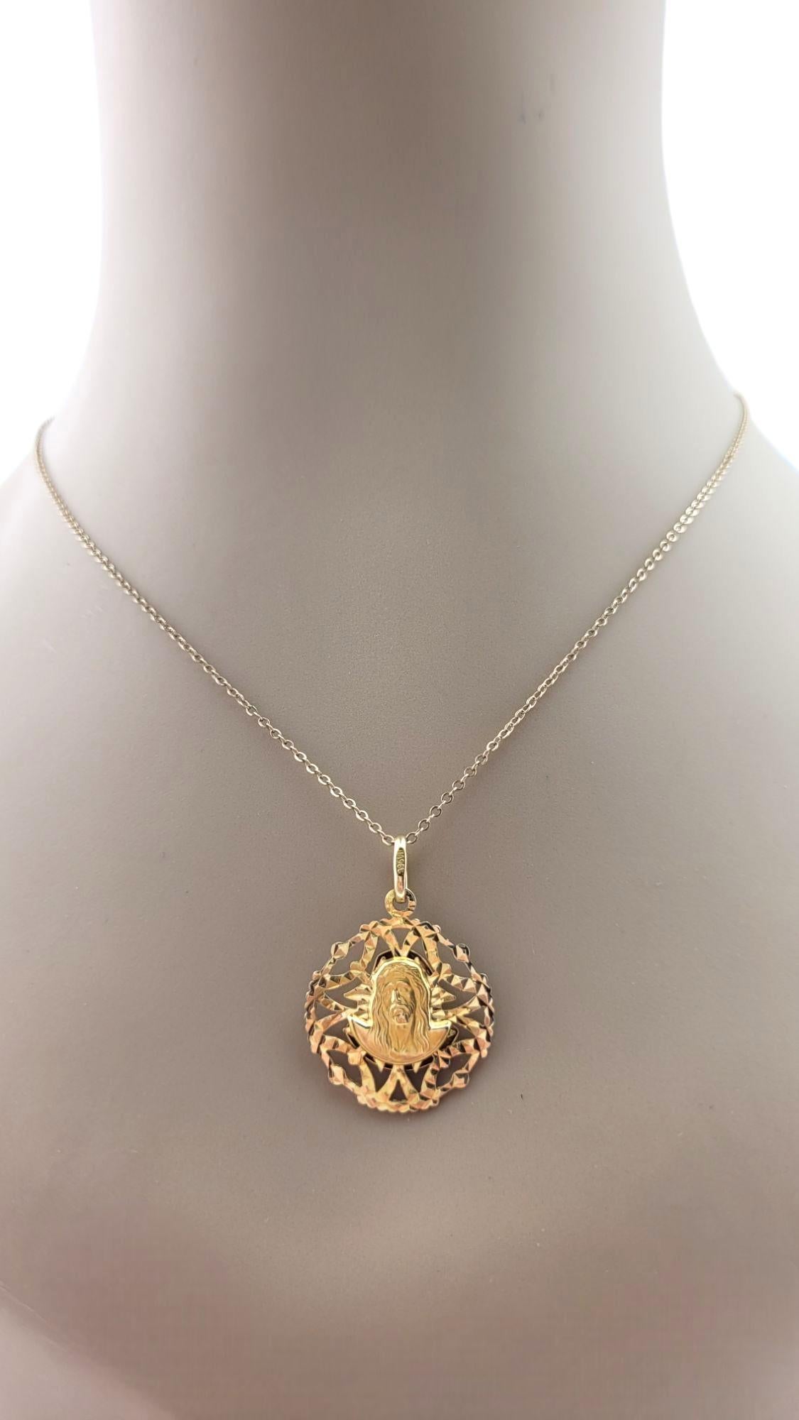 14 Karat Yellow Gold Oval Reversable Jesus Christ and Virgin Mary Pendant #21126 For Sale 5