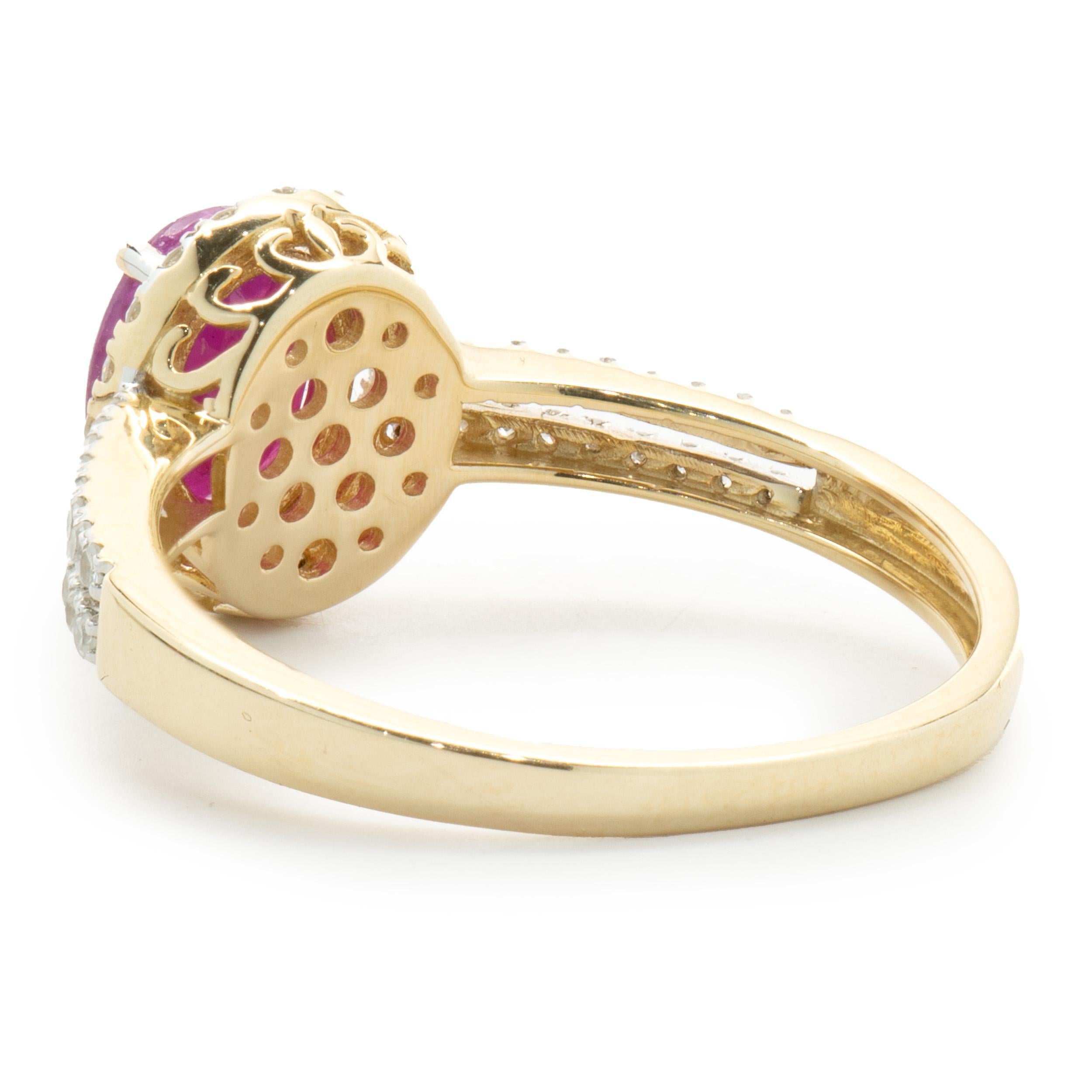 Oval Cut 14 Karat Yellow Gold Oval Ruby and  Diamond Ring For Sale