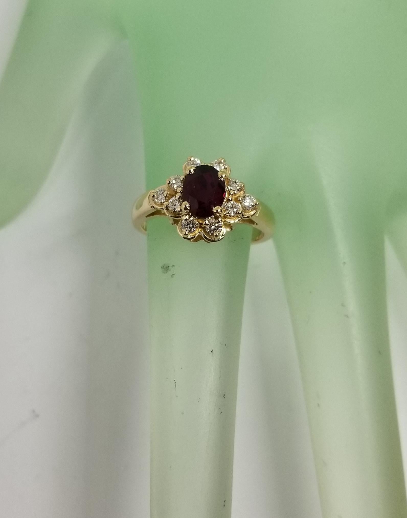 Women's GIA Certified 1.20cts. oval Ruby 14 Karat Yellow Gold Oval Ruby Diamond Ring For Sale