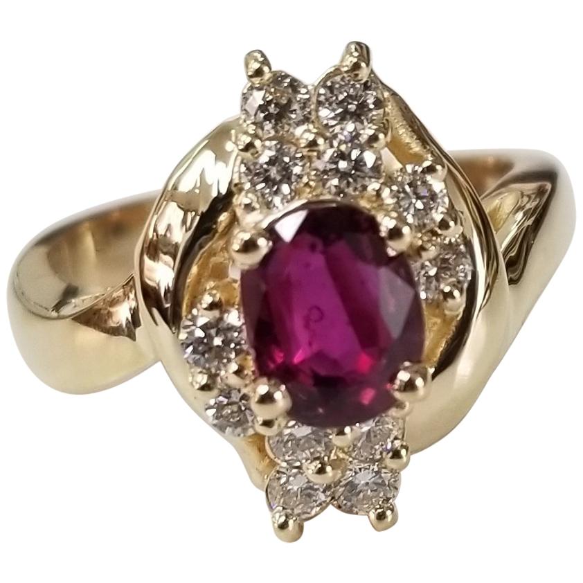 14 Karat Yellow Gold Oval Ruby Diamond Ring For Sale