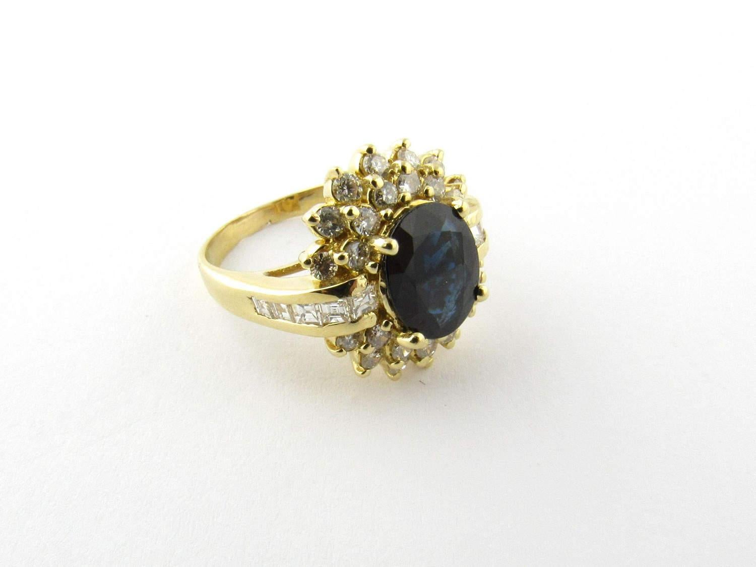 Vintage 14K Yellow Gold Oval Sapphire and Diamond Ring Size 6 

This large sapphire and diamond ring is sure to catch the eye. 

The center genuine sapphire is a deep blue and measures approximately 8mm x 10 mm 

The sapphire is framed by 10