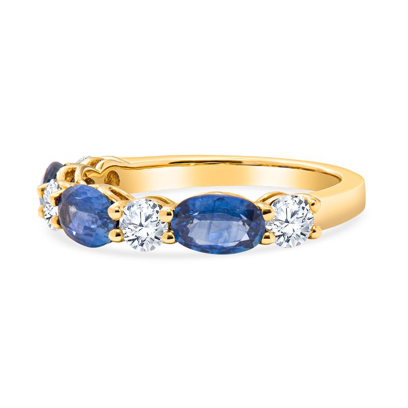Ce bracelet en or jaune 14 carats présente des saphirs bleus naturels de forme ovale d'un poids total de 1,56 carat alternant avec des diamants ronds d'un poids total de 0,58 carat sertis dans de l'or jaune 14 carats. Il s'agit d'une taille 6.5 mais