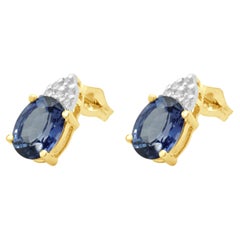 14 Karat Yellow Gold Oval Tanzanite and Diamond Stud Earrings