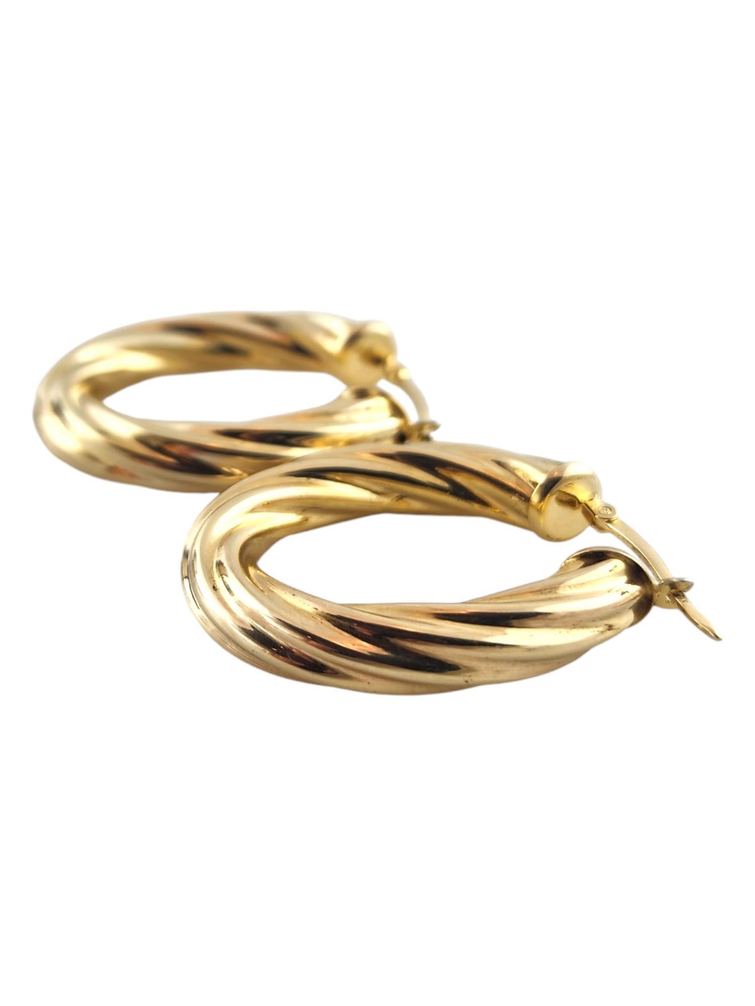 14 Karat Yellow Gold Oval Twisted Hoop Earrings #18987 In Good Condition For Sale In Washington Depot, CT
