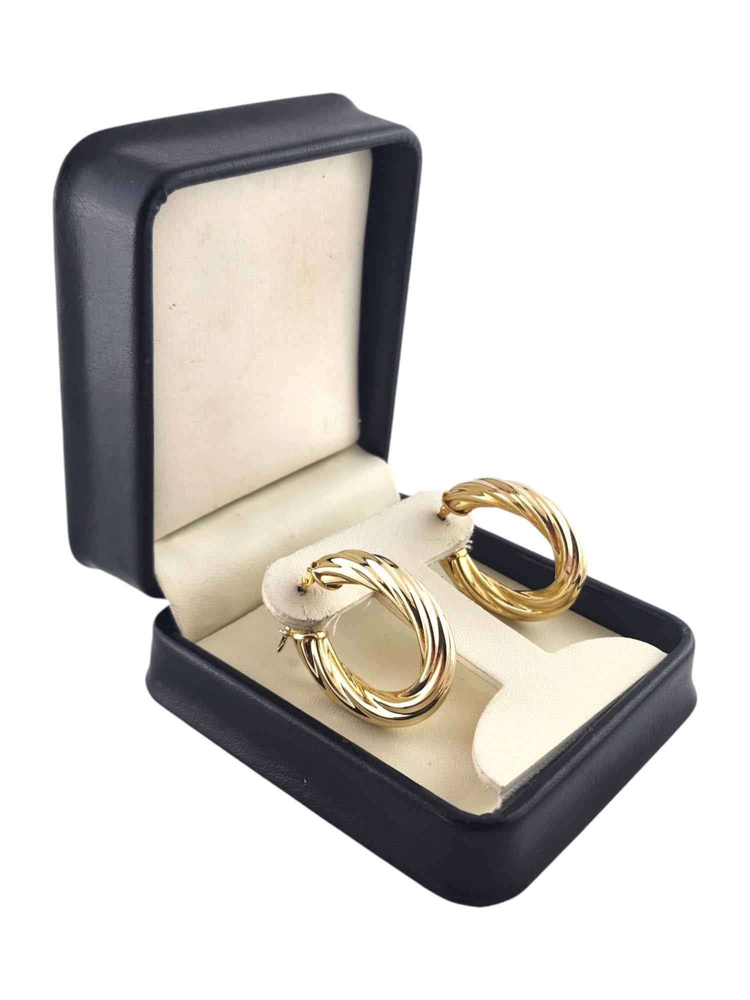14 Karat Yellow Gold Oval Twisted Hoop Earrings #18987 For Sale 5