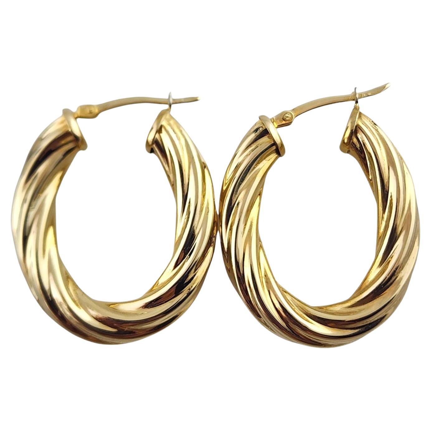 14 Karat Yellow Gold Oval Twisted Hoop Earrings #18987 For Sale