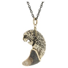 14 Karat Yellow Gold Panther Carved Tooth Necklace with Multi Colored Diamonds