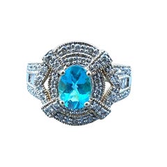 14 Karat Yellow Gold Paraiba Tourmaline Diamond Halo 1.30ctw Ring