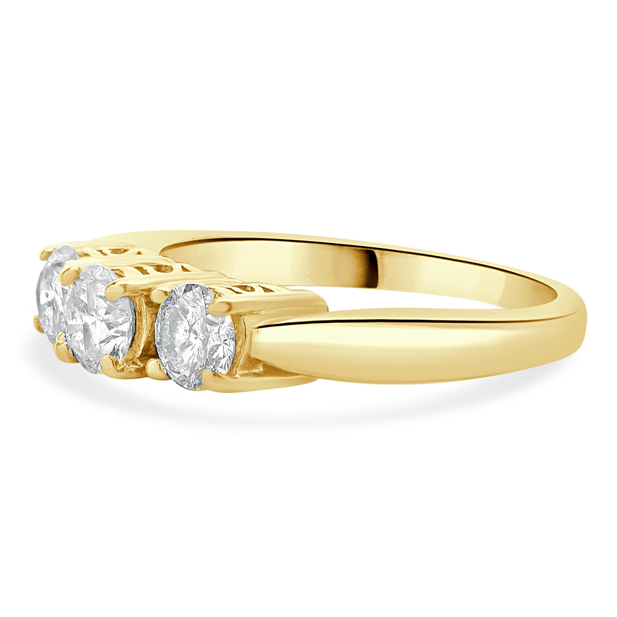 Material:14K yellow gold
Diamond: 3 round brilliant cut = 1.50cttw
Color: G
Clarity: I1
Ring Size: 7 (please allow up to 2 additional business days for sizing requests)
Dimensions: ring measures 3.8mm wide
Weight: 4.50 grams
