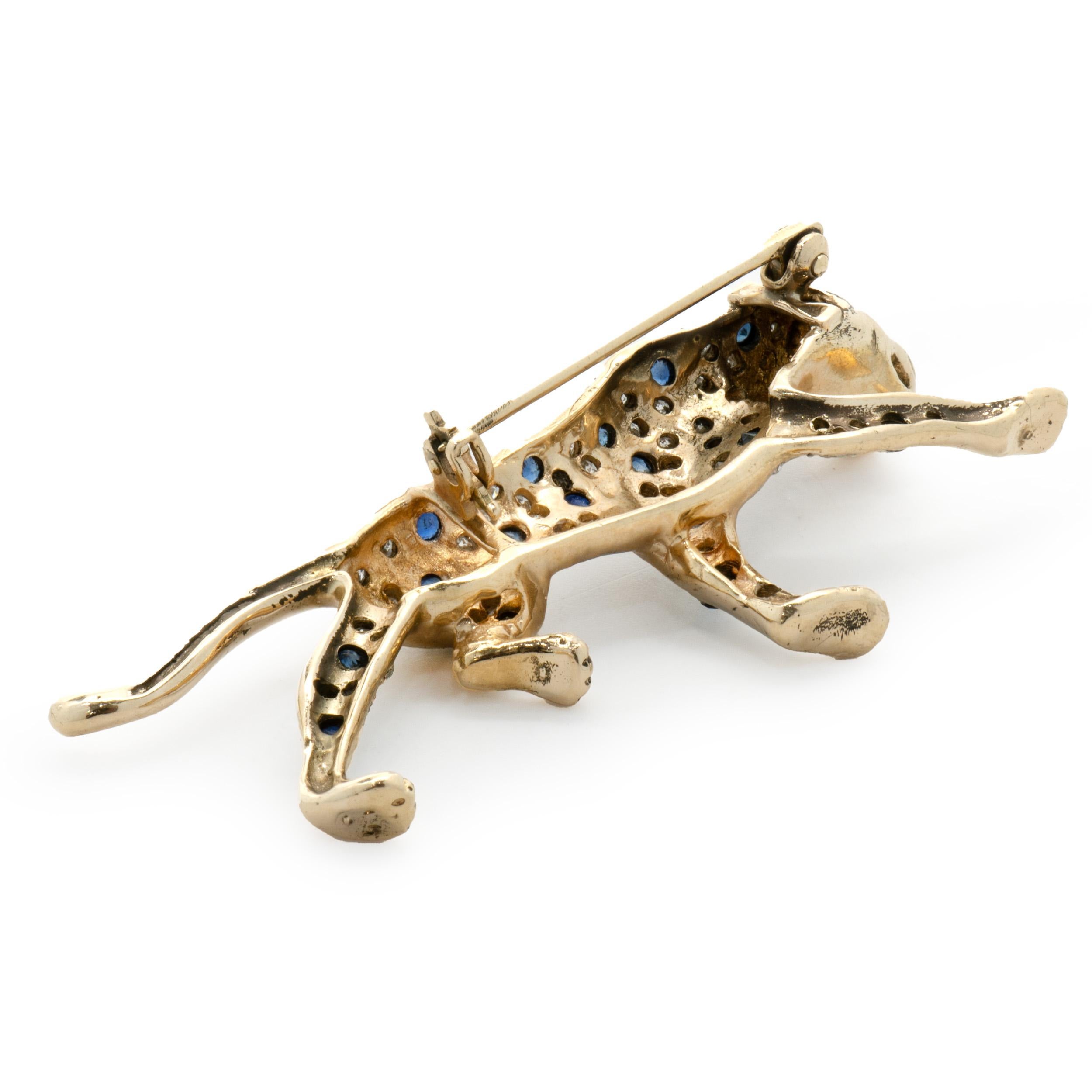 14 Karat Yellow Gold Pave Diamond and Sapphire Panther Pin  In Excellent Condition For Sale In Scottsdale, AZ