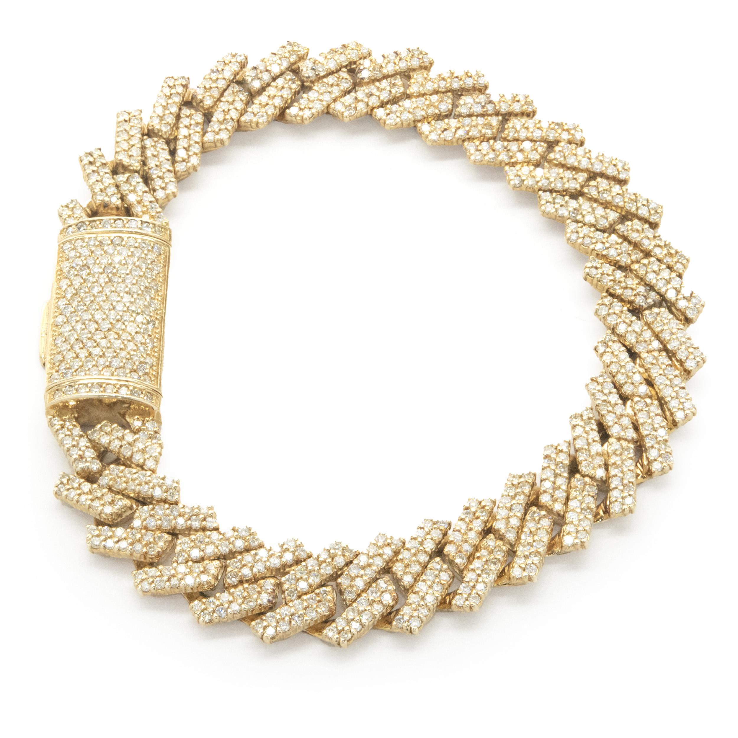 Material: 14K yellow gold
Diamonds: 467 round brilliant cut = 5.00cttw
Color: H
Clarity: SI1
Dimensions: bracelet measures 7.75-inches in length
Weight: 45.90 grams