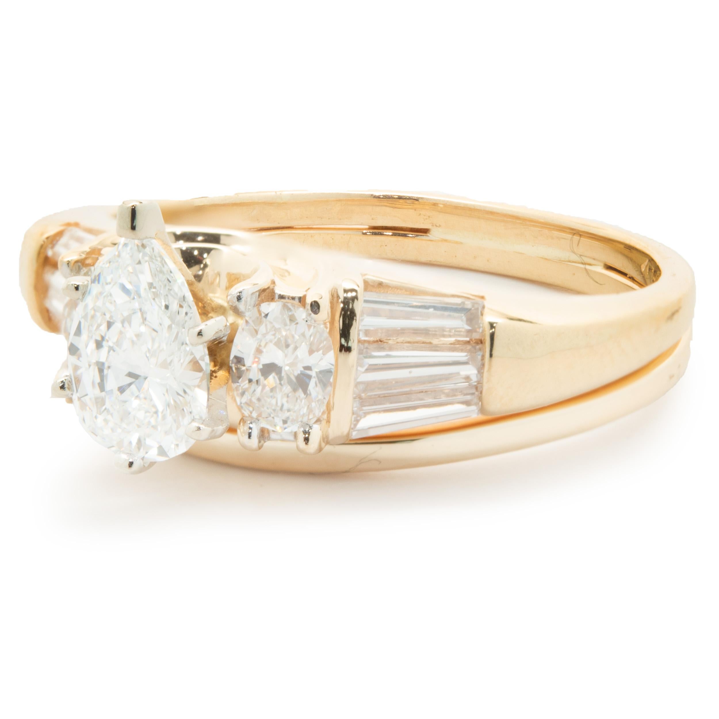 Designer: Custom
Material: 14K yellow gold
Diamond: 1 pear cut = 0.60ctw
Color: F
Clarity: VVS2
Diamond: 8 oval & baguette cut = 0.60cttw
Color: G
Clarity: VS
Dimensions: ring top measures 9mm wide
Ring Size: 7 (complimentary sizing