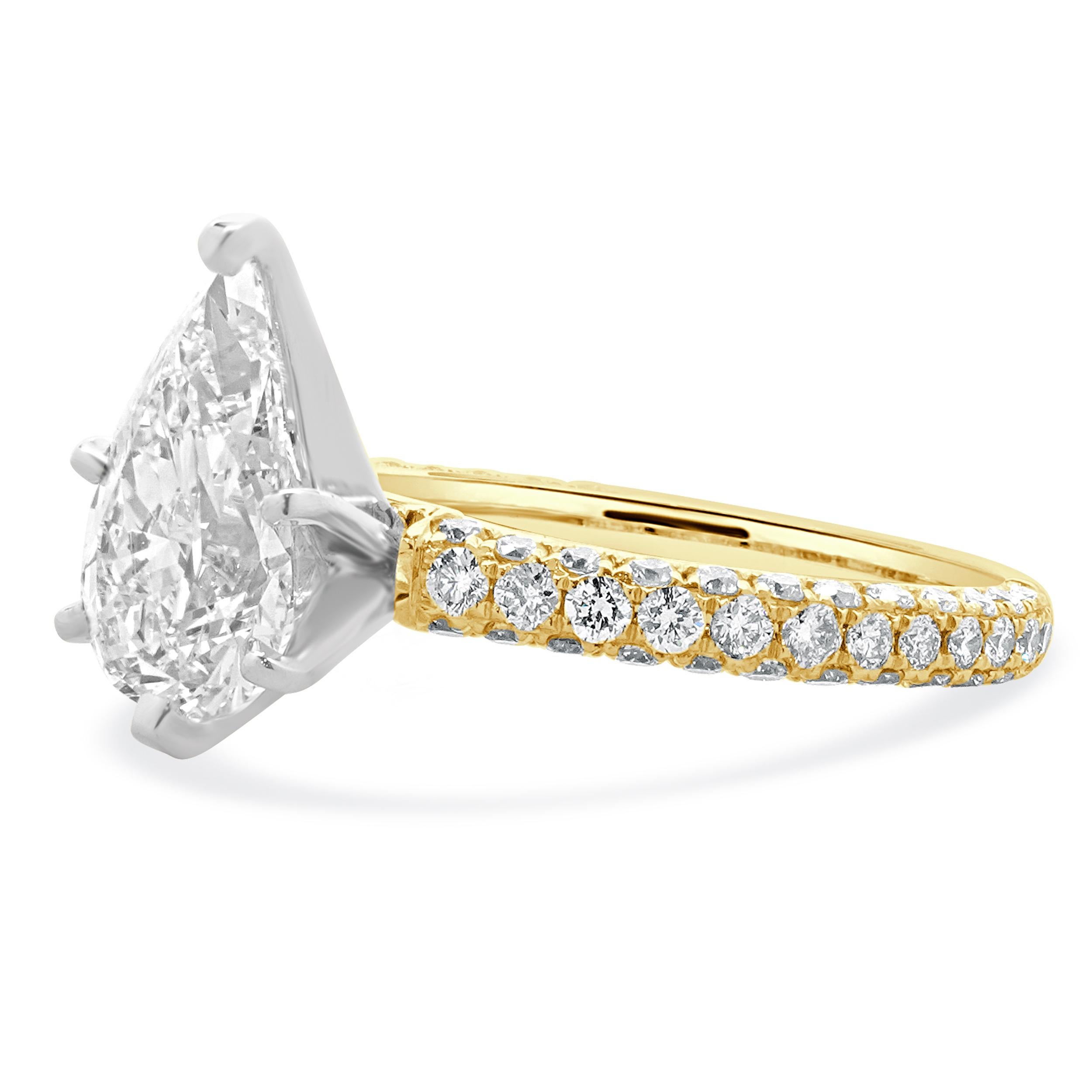 Material: 14K yellow gold
Diamond: 1 pear cut = 2.49ct
Color: L
Clarity: IF
GIA: 2235372957
Diamond: 72 round brilliant cut = 1.00cttw
Color: G
Clarity: VS1-2
Ring Size: 6.5 (please allow up to 2 additional business days for sizing