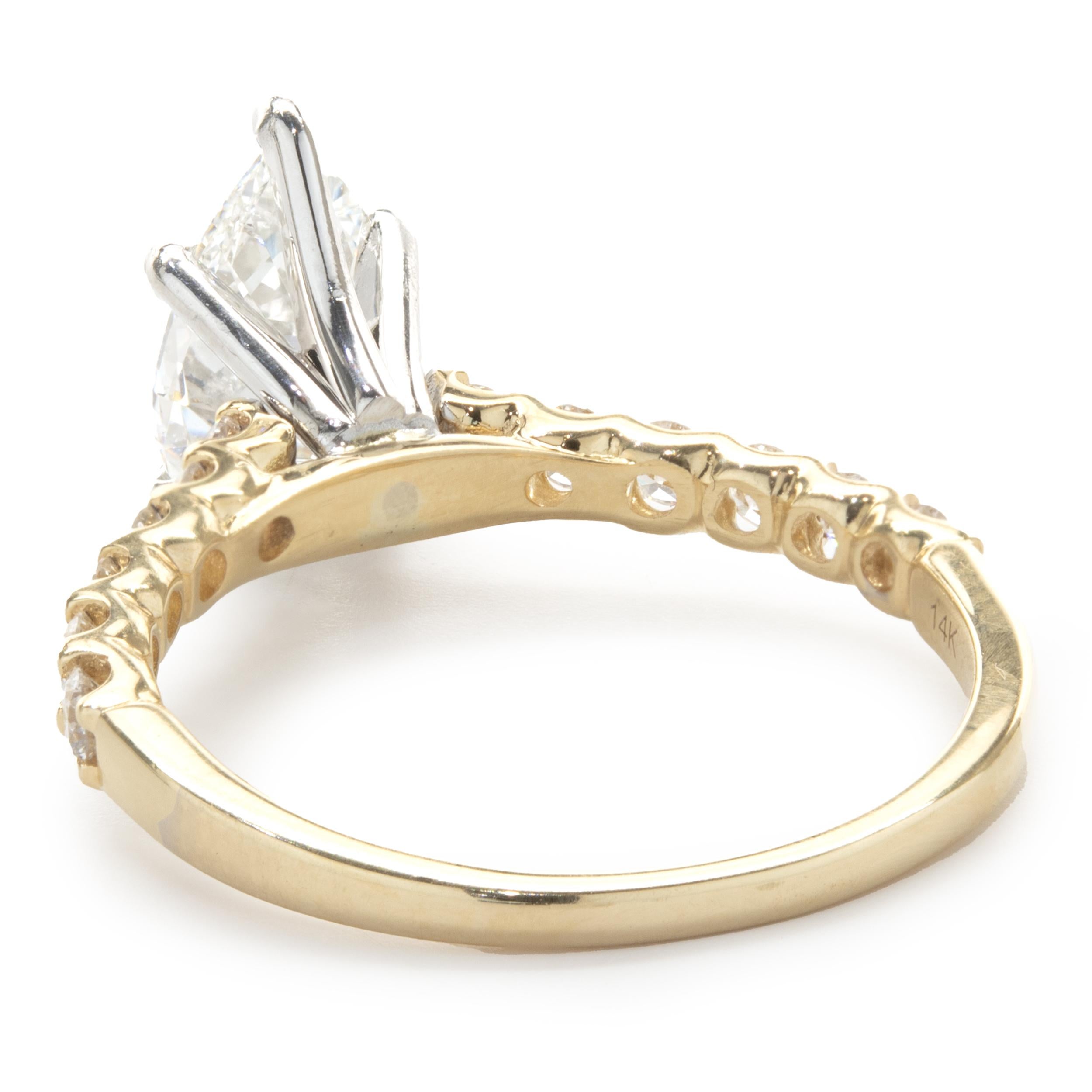 tilted pear engagement ring