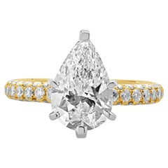 Anillo de compromiso de diamantes talla pera en oro amarillo de 14 quilates