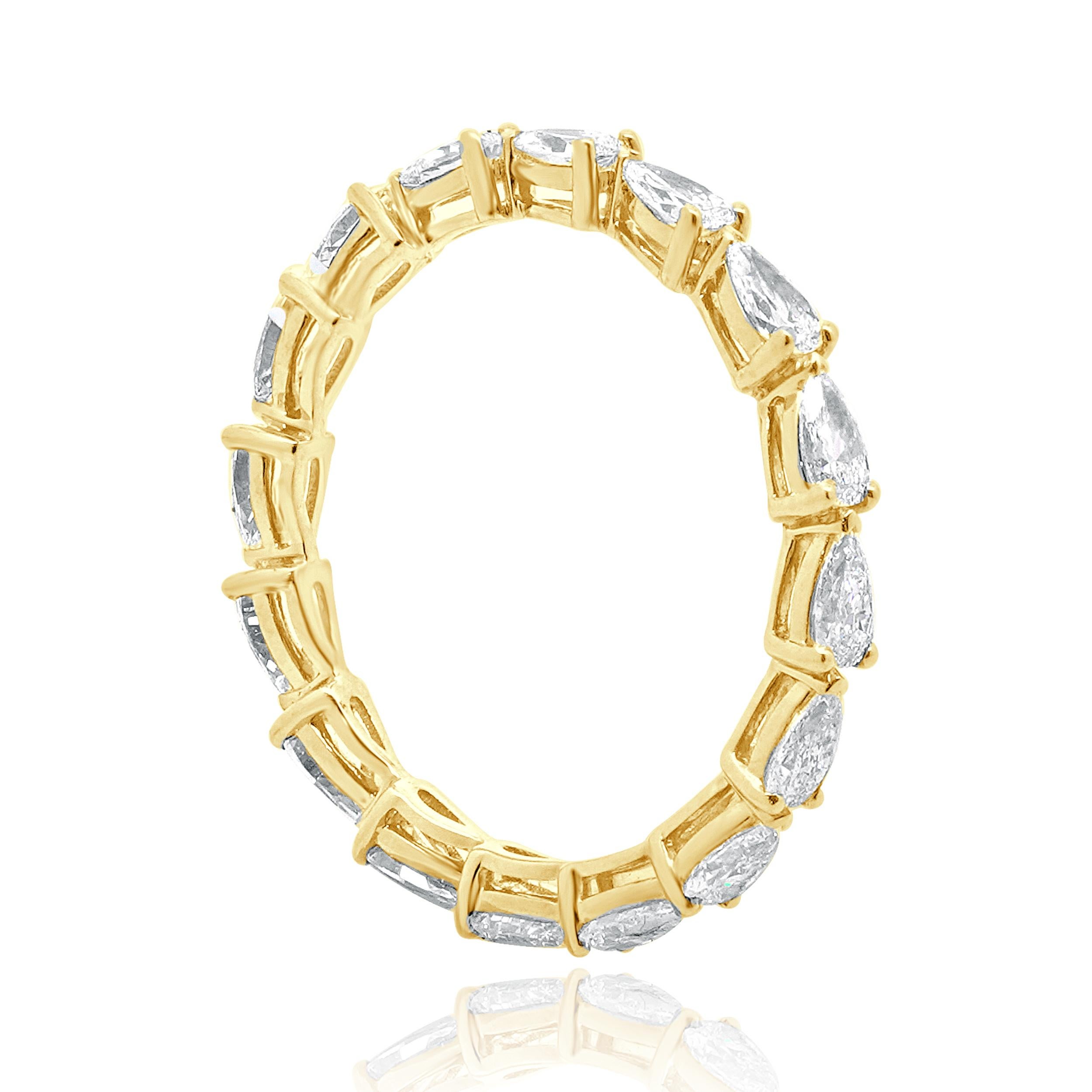 Designer: custom
Material: 14K yellow gold
Diamond: 16 pear cut = 1.15cttw
Color: G
Clarity: VS2
Ring size: 6.5 (please allow two additional shipping days for sizing requests)
Weight: 1.42 grams
