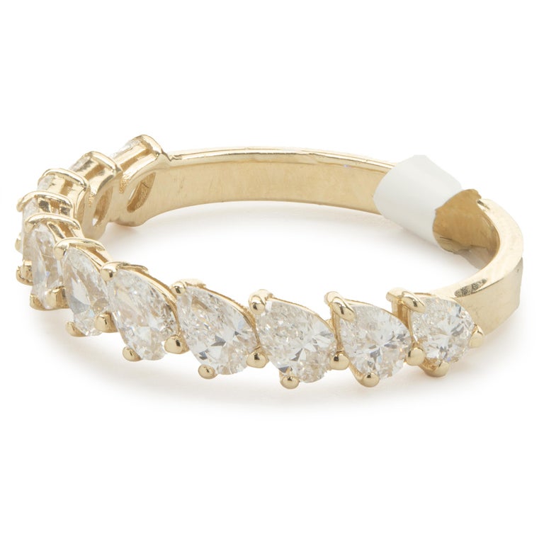 14 Karat Yellow Gold Pear Cut Diamond Tilt Band For Sale at 1stDibs
