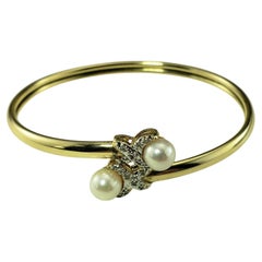 Armreif aus 14 Karat Gelbgold mit Perlen und Diamanten #19741