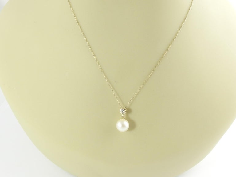 14 Karat Yellow Gold Pearl and Diamond Pendant at 1stDibs