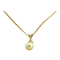 14 Karat Yellow Gold Pearl and Diamond Pendant 14 Karat Yellow Gold Pearl and Diamond Pendant