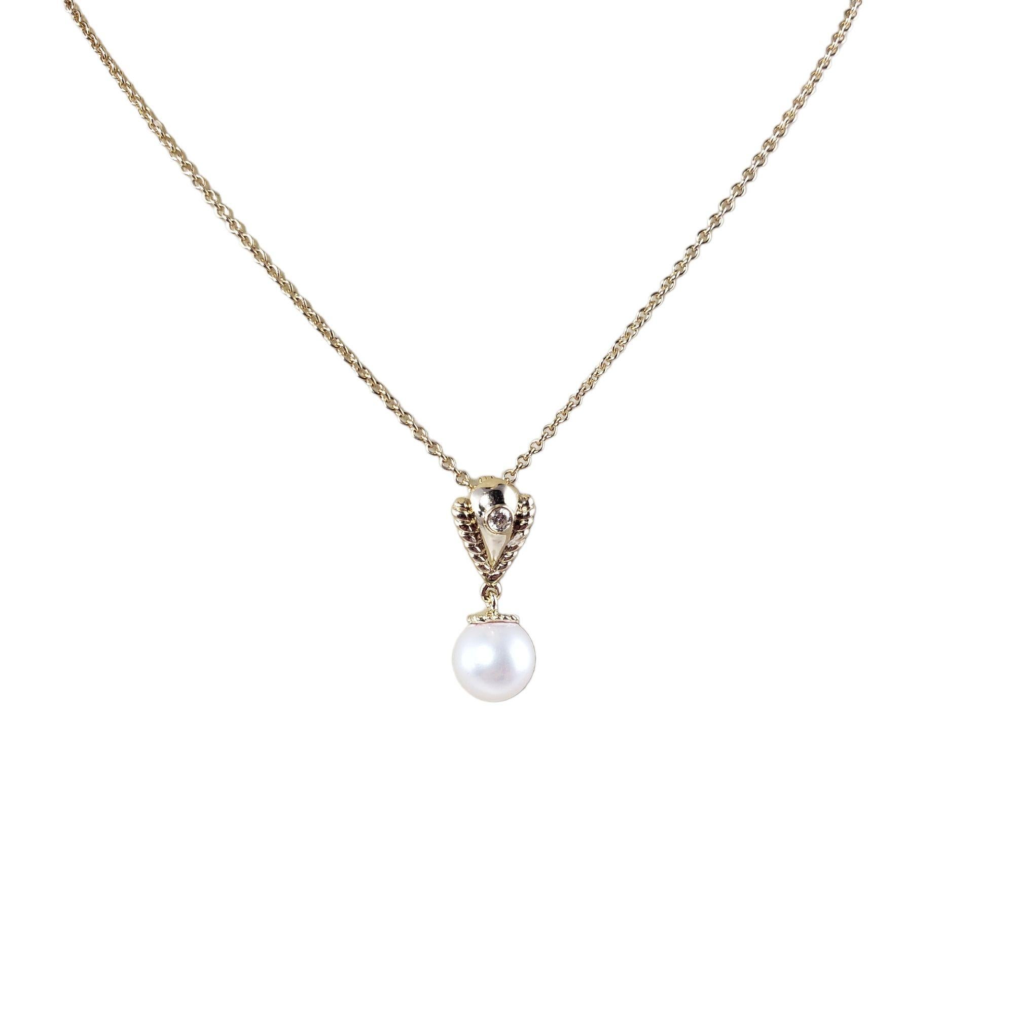 Vintage 14 Karat Yellow Gold Pearl and Diamond Pendant Necklace-

This elegant pendant features one 8 mm pearl and one round brilliant cut diamond set in beautifully detailed 14K yellow gold. Suspends from a classic cable necklace.

Approximate