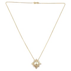 Vintage 14 Karat Yellow Gold Pearl and Diamond Pendant Necklace