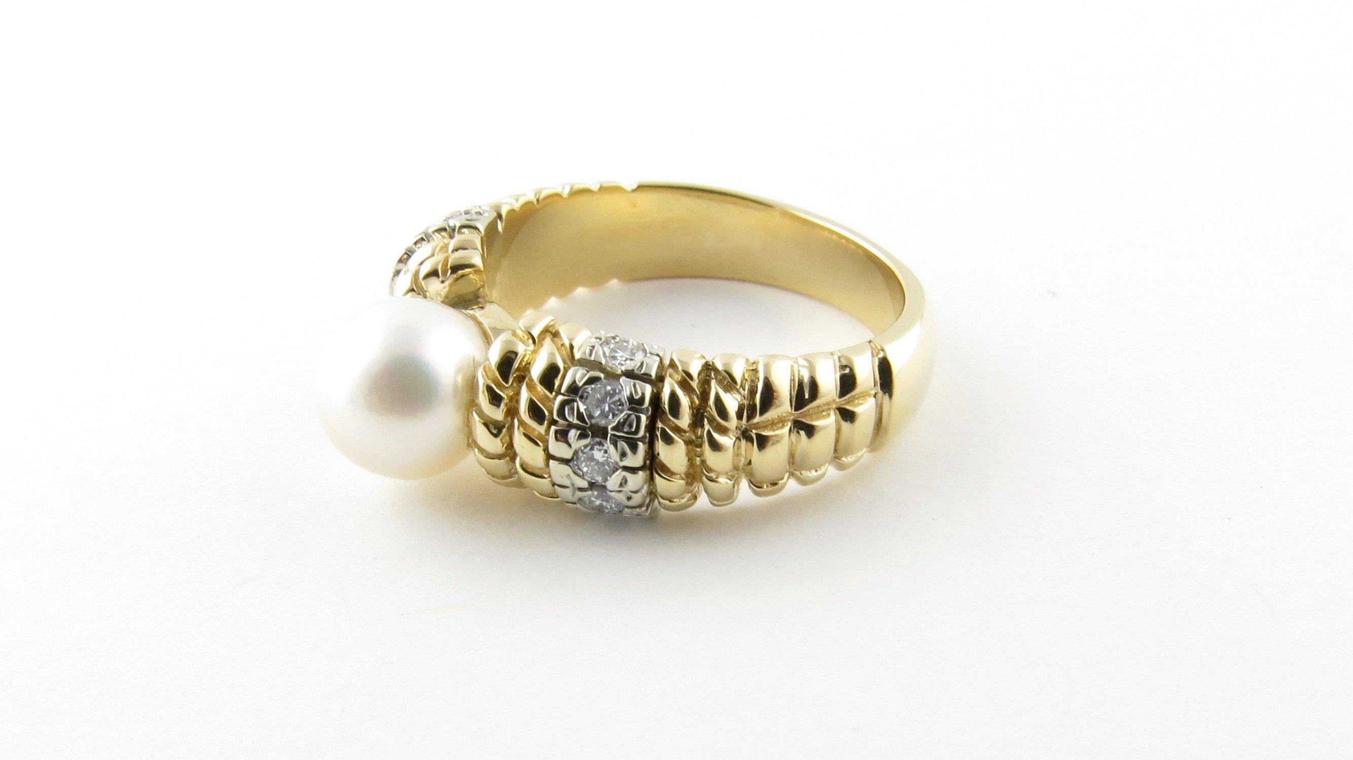 Vintage 14 Karat Yellow Gold Pearl and Diamond Ring Size 7- 
This lovely ring features one white cultured pearl (7 mm) accented with ten round brilliant cut diamonds and set in exquisitely detailed 14K yellow gold. Shank measures 4 mm. 
Approximate