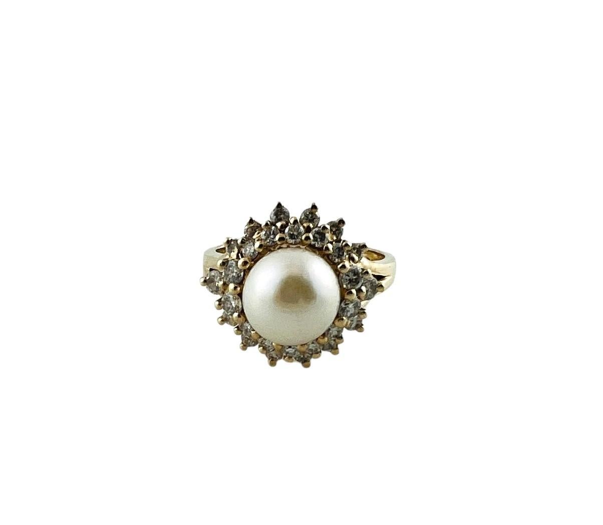 Vintage 14K Yellow Gold Pearl and Diamond Ring Size 7.5-

This stunning ring features one round white cultured pearl (9 mm) and 28 round brilliant cut diamonds set in classic 14K yellow gold.  Width: 15 mm.  Shank: 2 mm.

Approximate total diamond
