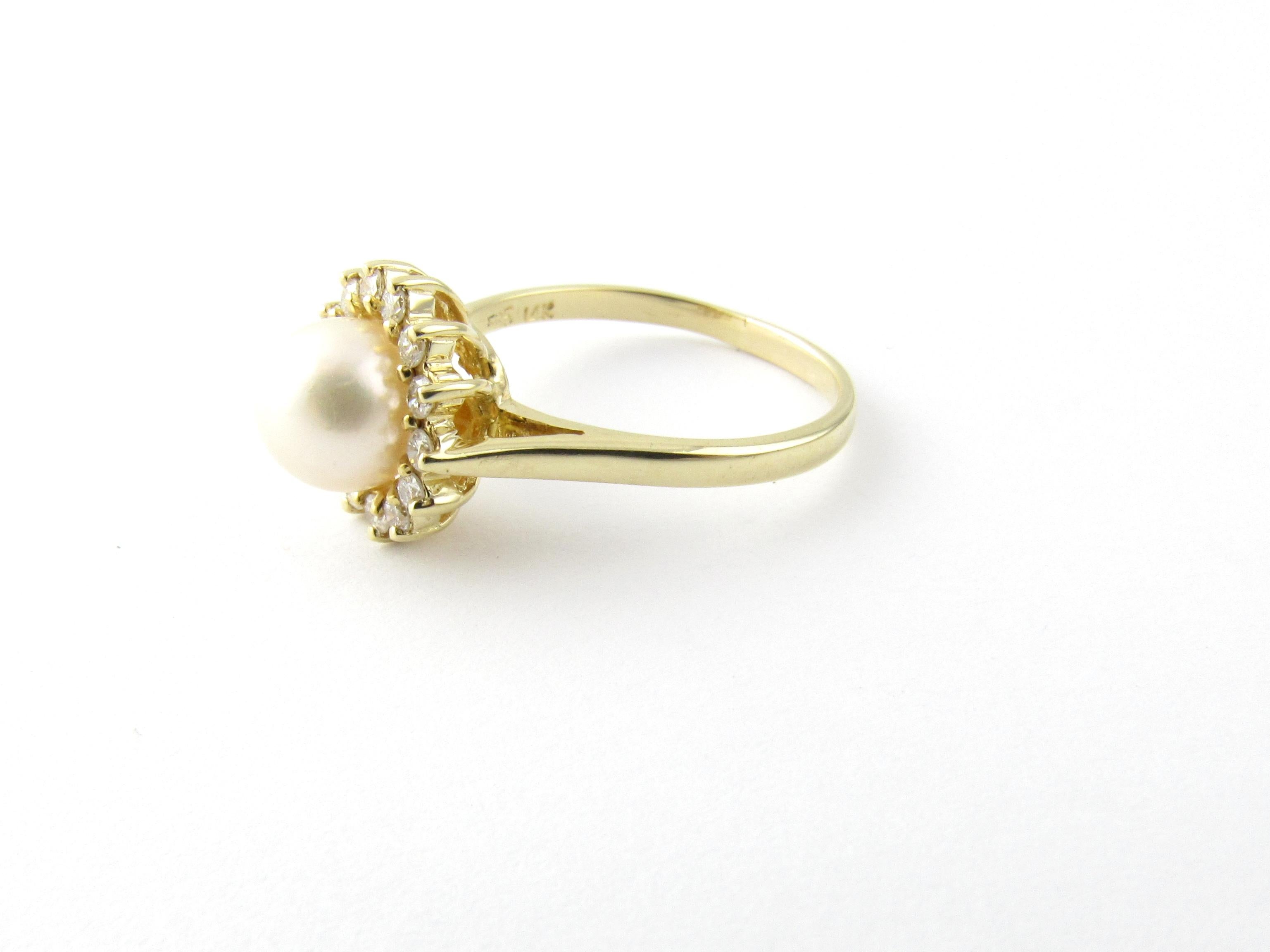 14 Karat Yellow Gold Pearl and Diamond Ring Size 8.5-

This elegant ring features one white pearl (7 mm) surrounded by 14 round brilliant cut diamonds and set in classic 14K yellow gold.  Top of ring: 11 mm.  Height: 10 mm.  Shank: 2