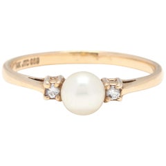 14 Karat Yellow Gold, Pearl and Diamond Three-Stone Ring, June Birthstone