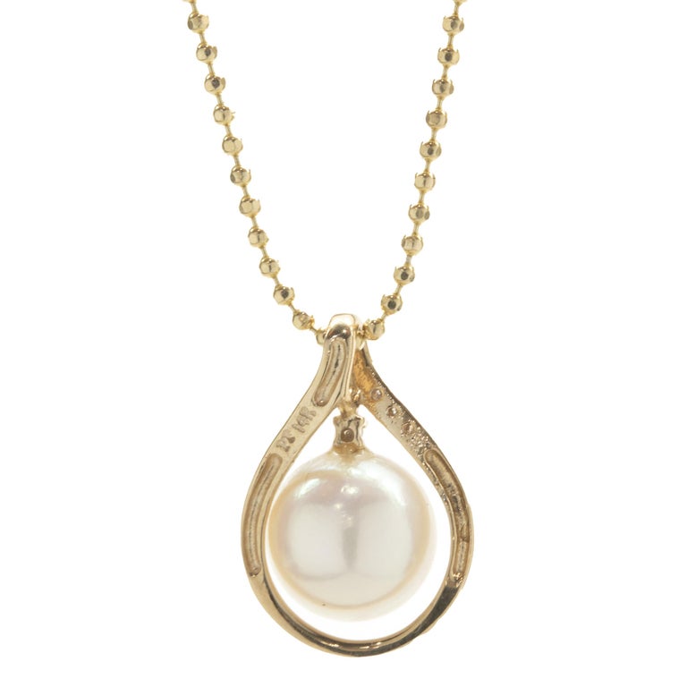 14 Karat Yellow Gold Pearl and Diamond Twist Necklace For Sale at 1stDibs