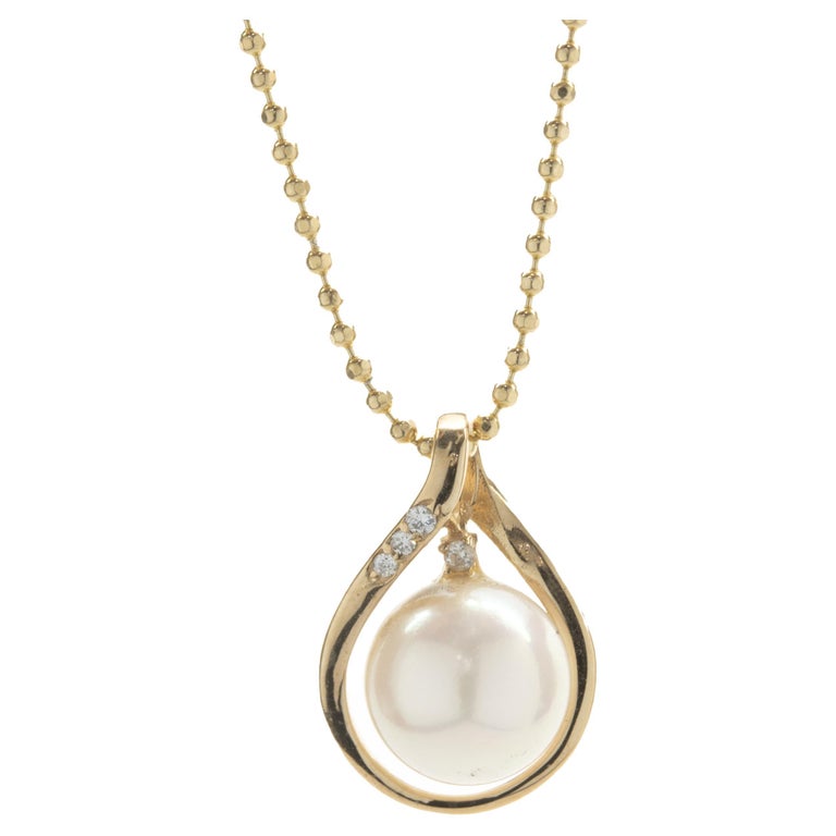 14 Karat Yellow Gold Pearl and Diamond Twist Necklace For Sale at 1stDibs