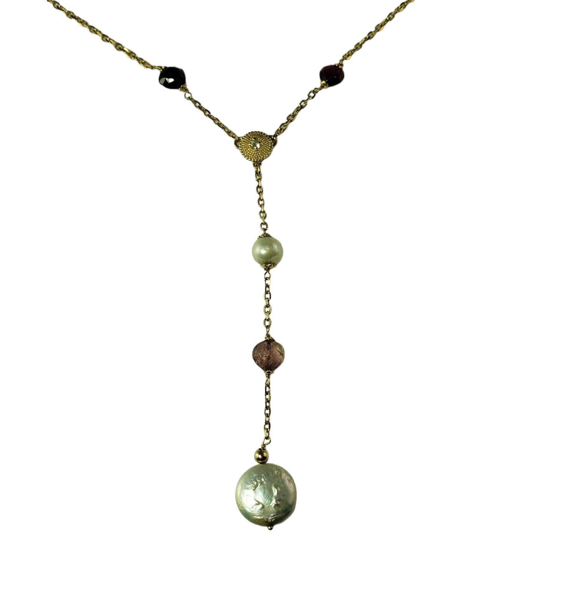 Vintage 14 Karat Yellow Gold Pearl and Tourmaline Drop Necklace-

This lovely drop necklace features five white pearls, one round single cut diamond and five briolette Bi- Color Tourmalines set on a classic 14K yellow gold chain.

Approximate total