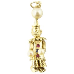 Vintage 14 Karat Yellow Gold Pearl, Ruby and Sapphire Articulated Clown Pendant