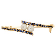 14 Karat Yellow Gold Pearl, Sapphire and Diamond Bangle Bracelet