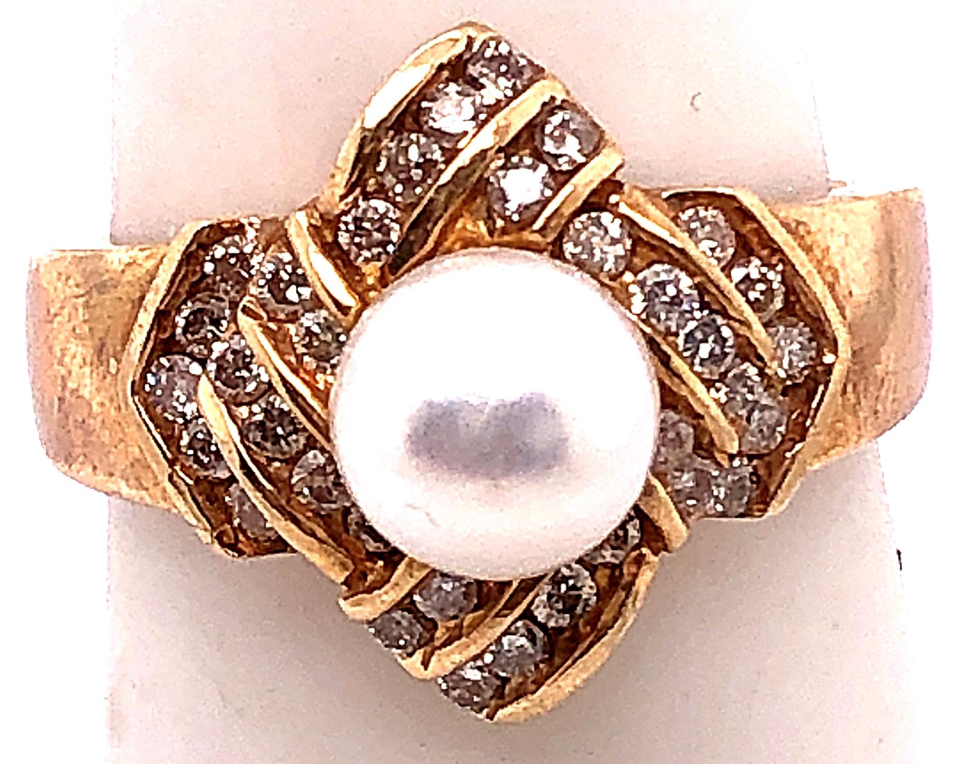 14 Karat Yellow Gold Pearl Solitaire With Diamond Accents Ring
50 piece of round diamonds with 1.00 total diamond weight.
7.00 by 7.00 mm Round Pearl.
Size 7
5.40 grams total weight.
height: 20 mm
width: 20 mm