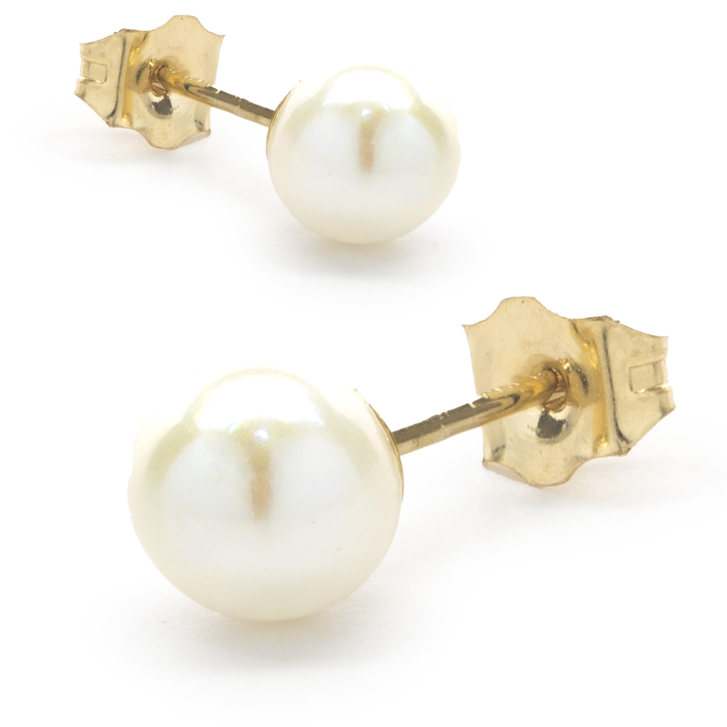 Designer: custom designed
Material: 14K yellow gold
Dimensions: earrings measure 5.60mm
Weight: 0.70 grams