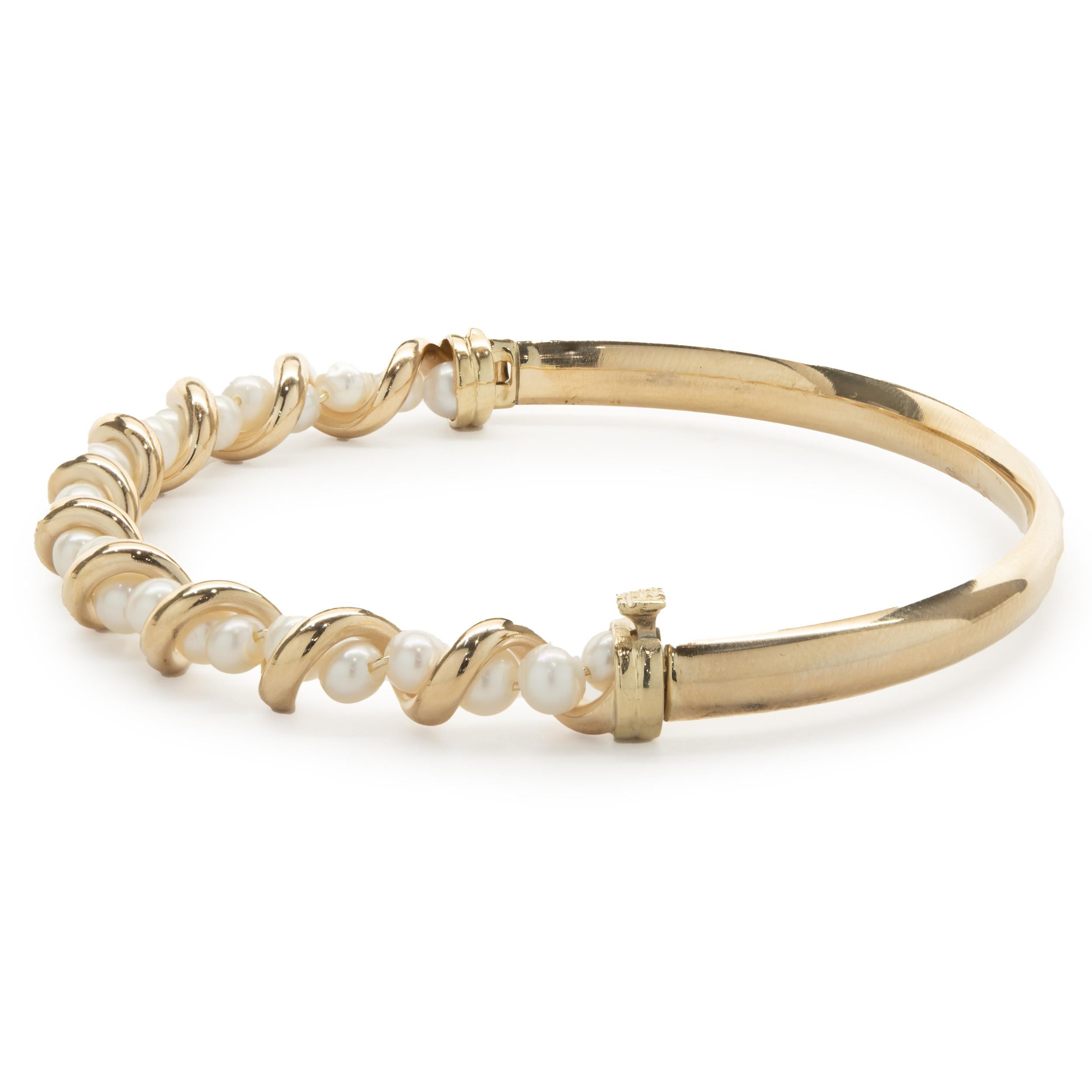 Designer: custom
Material: 14K yellow gold
Weight: 7.21 grams
Pearl: 3.25mm
Dimensions: bracelet will fit up to an 6.5-inch wrist