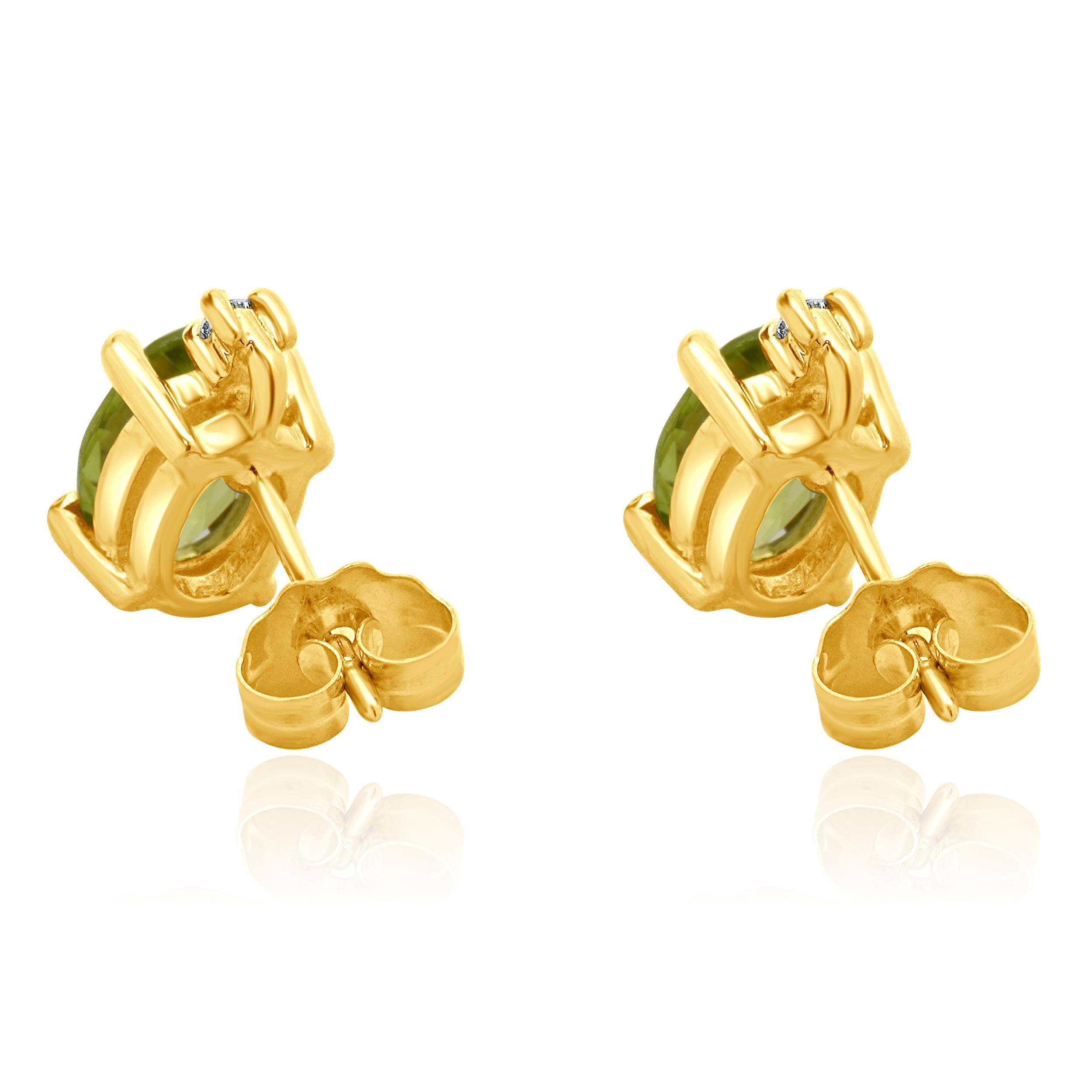 Oval Cut 14 Karat Yellow Gold Peridot and Diamond Stud Earrings For Sale