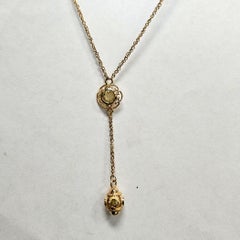 Collier en Y en or jaune 14 carats avec péridot
