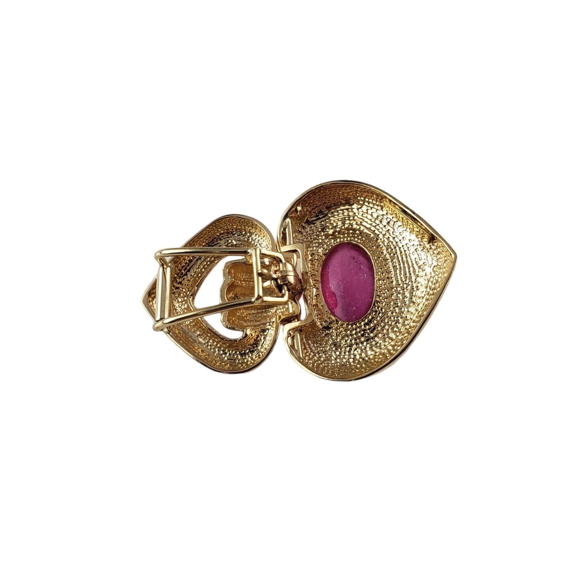 Vintage 14 Karat Yellow Gold Pink Tourmaline and Diamond Pendant JAGi Certified-

This stunning pendant features one oval cabochon pink tourmaline (14 mm x 10 mm) and four round brilliant cut diamonds set in beautifully detailed 14K yellow